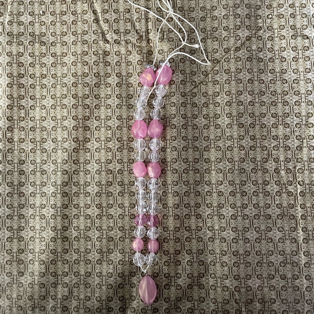 This is a pink necklace